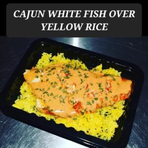 CAJUN WHITE FISH OVER YELLOW RICE
