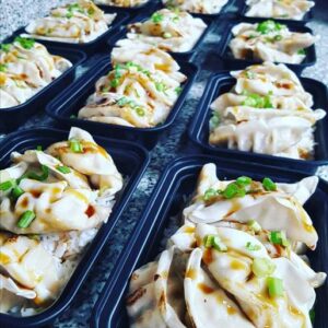 PAN SEARED TERIYAKI CHICKEN DUMPLINGS WITH JASMINE RICE